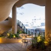 pHOTO OF ONE RIVER NORTH APARTMENT BUILDING WITH CANYON IN FACADE